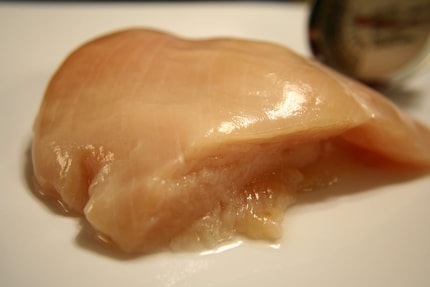 Pale pink and unusable: The chicken breast in its raw form