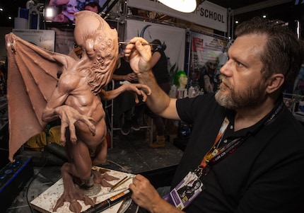 Lee working on his Cthulhu standing sculpture at San Diego ComicCon.