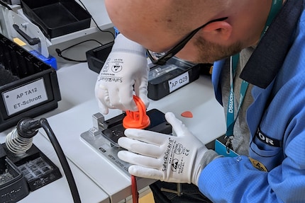 Lifting the back with the suction cup.