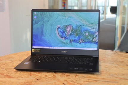 14 inches and a wide bezel under the display.