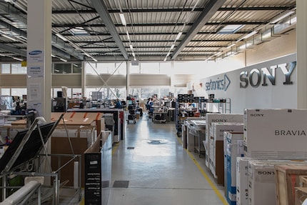 Boxes of TVs lined up in the Sertronics hall.