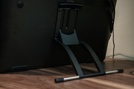 You can buy the stand for the Cintiq 16, the Cintiq 22 comes with it.