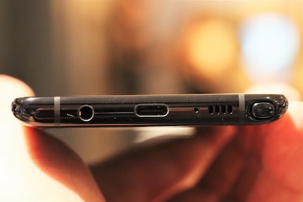 With stylus and headphone jack.