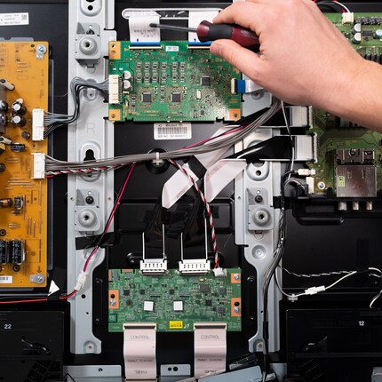 The small boards are located in the middle; in between the power supply and mainboard
