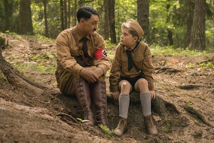 Director and Hitler (Taika Waititi) and Jojo (Roman Griffin)