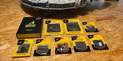 The box on the top left contains the eight little bags filled with parts.