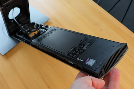 ... and remove the PC from the holder.