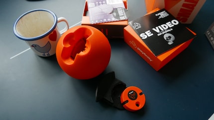 The sensor (bottom) goes into the ball with the black drawer.