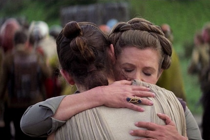 ...to give Rey, who she's never met before, a hug.