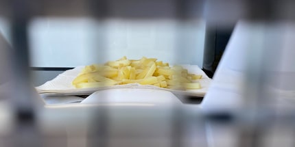 The waxy potatoes are already cut and cooked, the floury ones still have to go through.