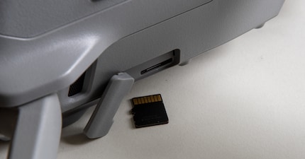 On the Mavic Air 2, the card slot is protected by a rubber cover.