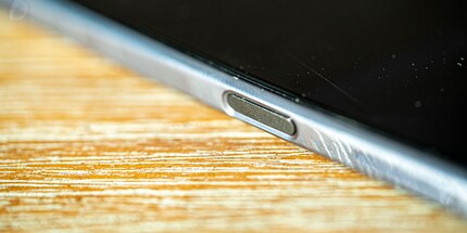 The fingerprint sensor on the side isn't reliable and should be removed completely.