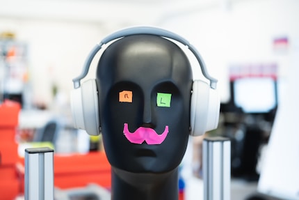 The chancellor with Microsoft headphones