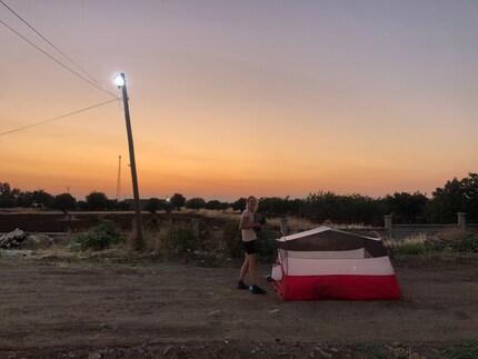 Pretty much like an all-inclusive holiday: a tent next to the petrol station.