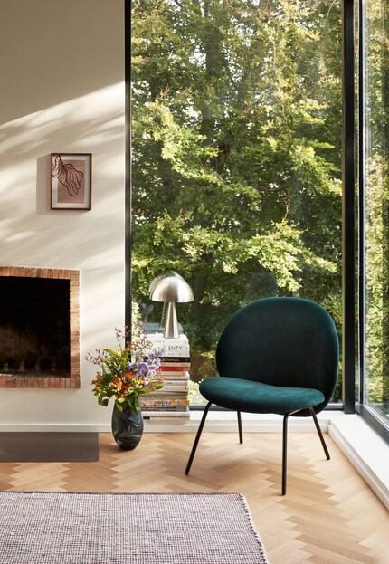 A stack of books as a side table... Photo: Hübsch
