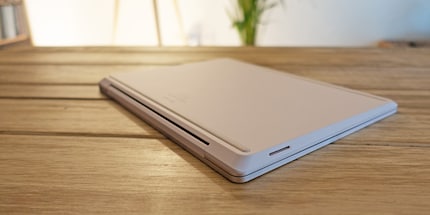 Metal on top, plastic underneath. The Surface Connect port you can see is for power.