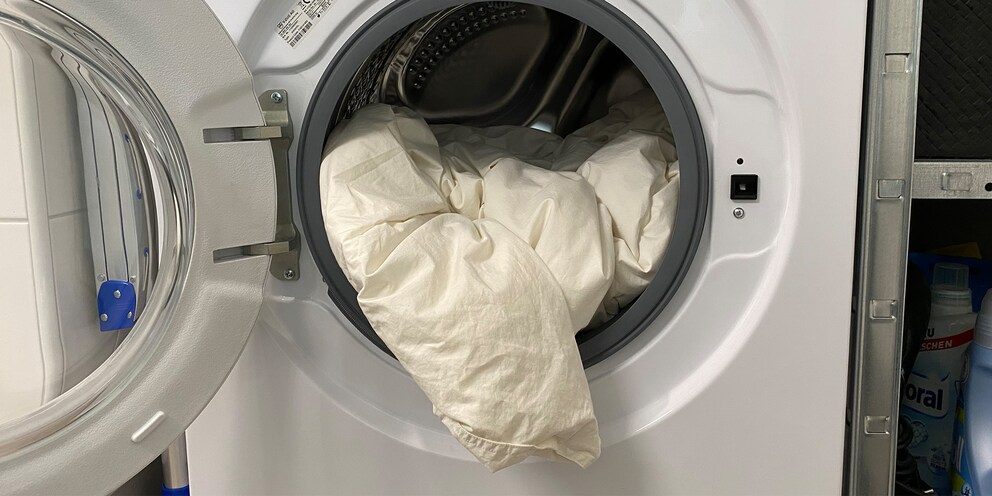 Nicht zögern: Du darfst die Bettdecke in der Waschmaschine waschen.
