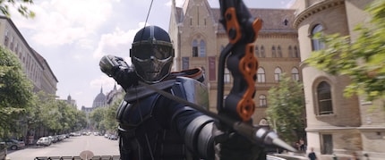 We don’t know who’s under that helmet at first.