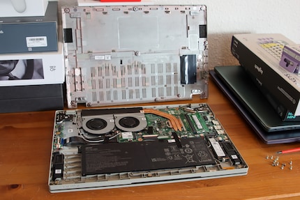 The battery rests on just two pins and is held in place by the underside of the case.
