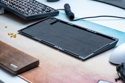 The thinner case insulation mat I use for this review.