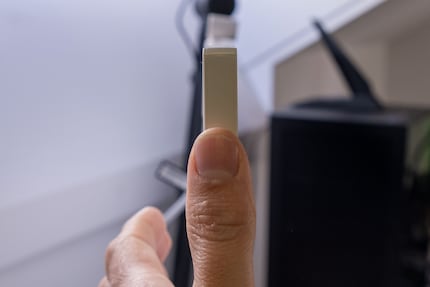 My thumb compared to the monitor’s thickness.
