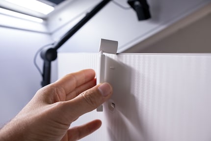 The SlimFit camera attaches magnetically.