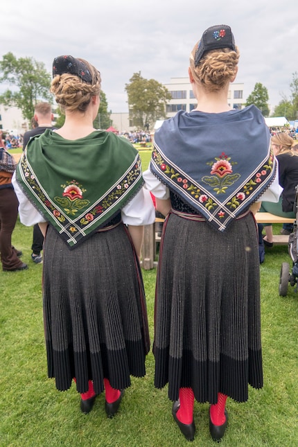 Two «ladies of honour» in traditional garb at the 106th Cantonal Alpine Wrestling Festival or «Schwingfest» in Oberwil, Basel-Country.