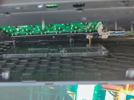The cable that connects the battery to the daughterplate is incredibly short.