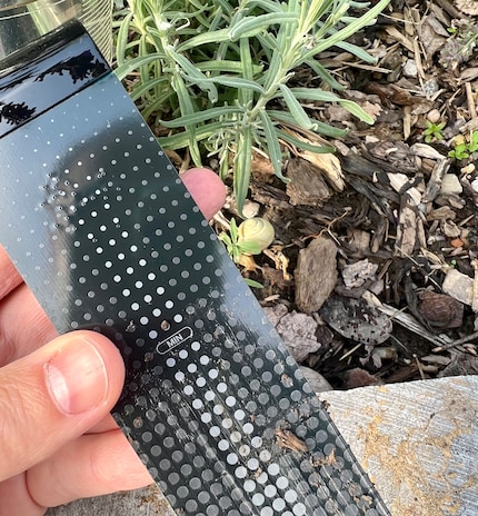 This is where the soil’s moisture level is measured. The piece of metal has to go into the ground.