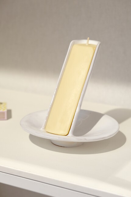 As the gloss is transparent, you see hints of clay coming through.