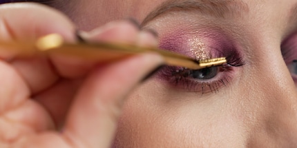 The final touch: fake eyelashes.
