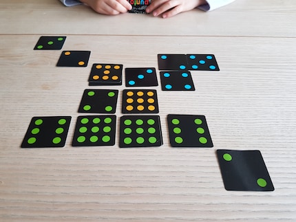 I’m about to tell my daughter to put a blue card on the right next to my green so I can’t finish my row.