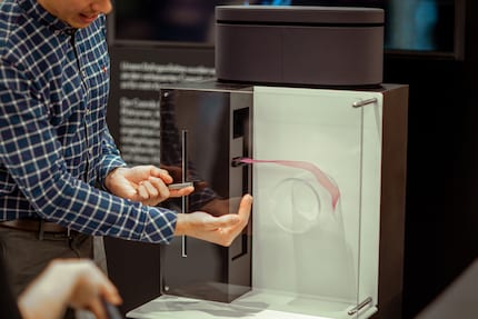 Ayrton demonstrates the Coandă effect, which Dyson engineers used to their advantage when developing the Airwrap.
