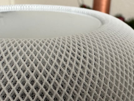 The honeycomb structure of the fabric covering the HomePod 2.