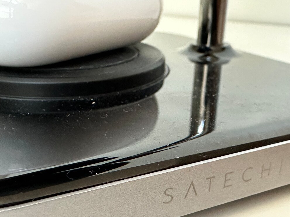 The glossy black surface magically attracts dust.