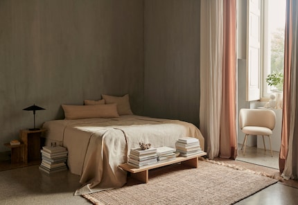 A bit of decoration accentuates casual items, such as stacks of books.