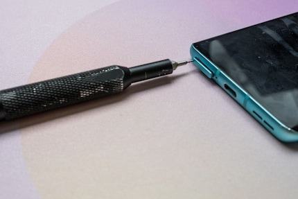 Yes, the iFixit kit even contains an attachment for removing SIM cards.