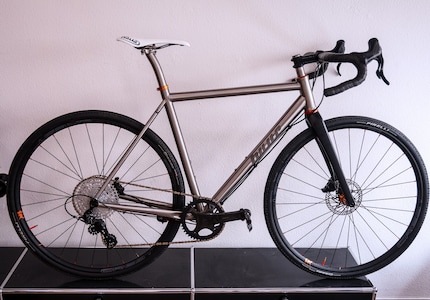 This gravel bike featuring a titanium frame and Campagnolo mechanical groupset makes my heart beat faster.