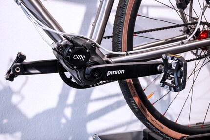 The bottom bracket gears are made by Pinion; the belt by Gates.
