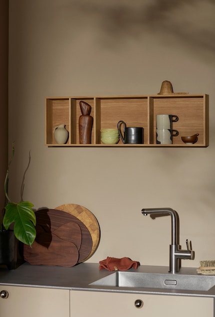 Compact kitchen shelf «Bon» is a great place to present pretty items. Photo: Ferm Living