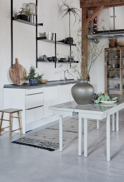 The shelving system «Fari» provides storage space, which is also a display area.