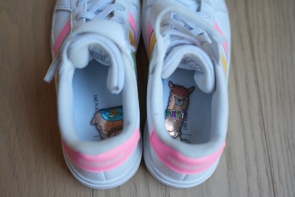 Hello llama: first puzzle then shoes.