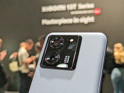 Two cameras stand out, while the third looks tiny.