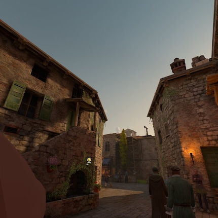 Monteriggioni: The small town looks lively. On the left of the picture you can see the tip of Ezio's nose.