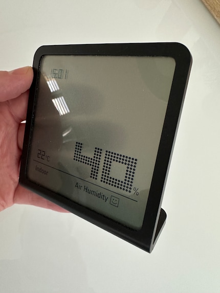 The display is semi-transparent. Here you can see my fingers on the back.