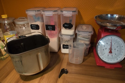 My ingredients section, with the bread pan and kneading paddle in the foreground .