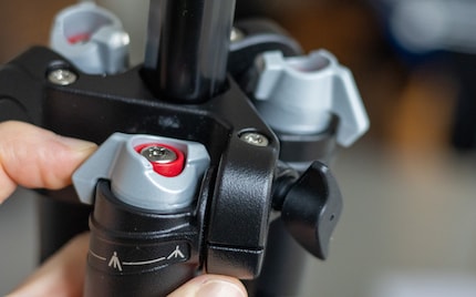 The Manfrotto mechanism is a bit more complicated but offers more flexibility.