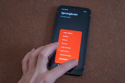 The third option for quick access to actions is via the red dot on the home screen.