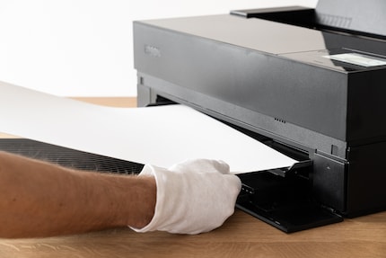 I have to feed any thicker paper into the SC-P900 from the front. It takes quite a while every time.