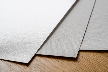 Three different types of paper from Hahnemühle. One with a satin finish and two with a matt finish.